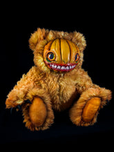 Load image into Gallery viewer, Grizzly Gourd: HAUNTVESTER - CRYPTCRITZ Handcrafted Creepy Cute Halloween Pumpkin Art Doll Plush Toy for Spooky Souls
