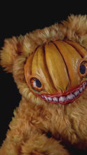 Load and play video in Gallery viewer, Grizzly Gourd: HAUNTVESTER - CRYPTCRITZ Handcrafted Creepy Cute Halloween Pumpkin Art Doll Plush Toy for Spooky Souls
